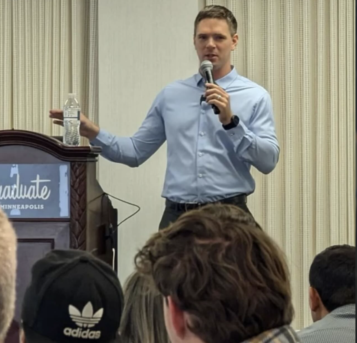 Jason speaking on stage